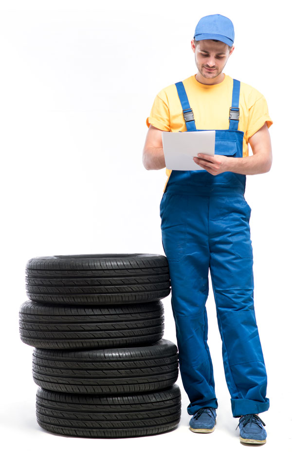 Tyre repair man with tyres